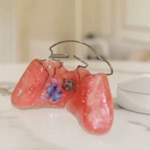 Modelos de aparelhos ortodônticos infantis utilizados em ortodontia intercetiva na Mediminho, em Braga, com designs coloridos adaptados a crianças.